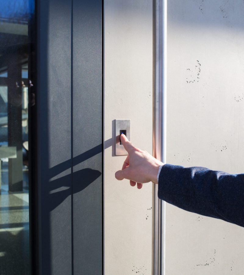 opening front door of house by fingerprint. modern smart digital technologies. biometric lock