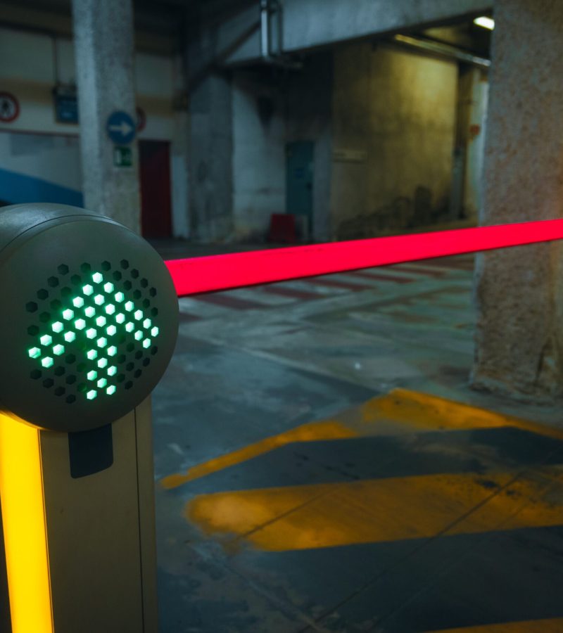 A view of a sign with an illuminated up arrow applied on the barrier